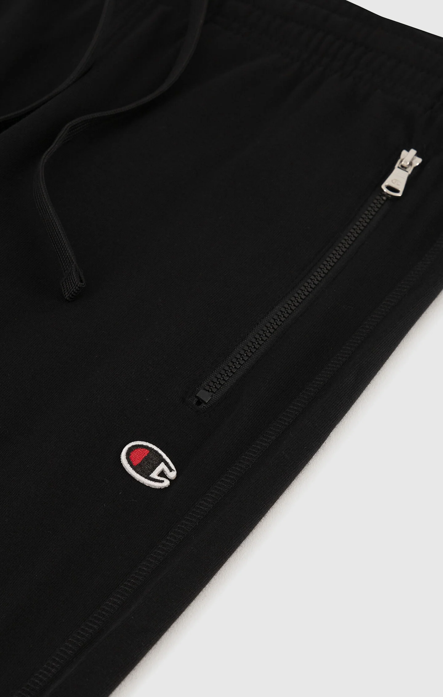 Champion Slim Fit Herren Leichte Rib Cuff Pants mit Reißverschlusstaschen Icons Schwarz
