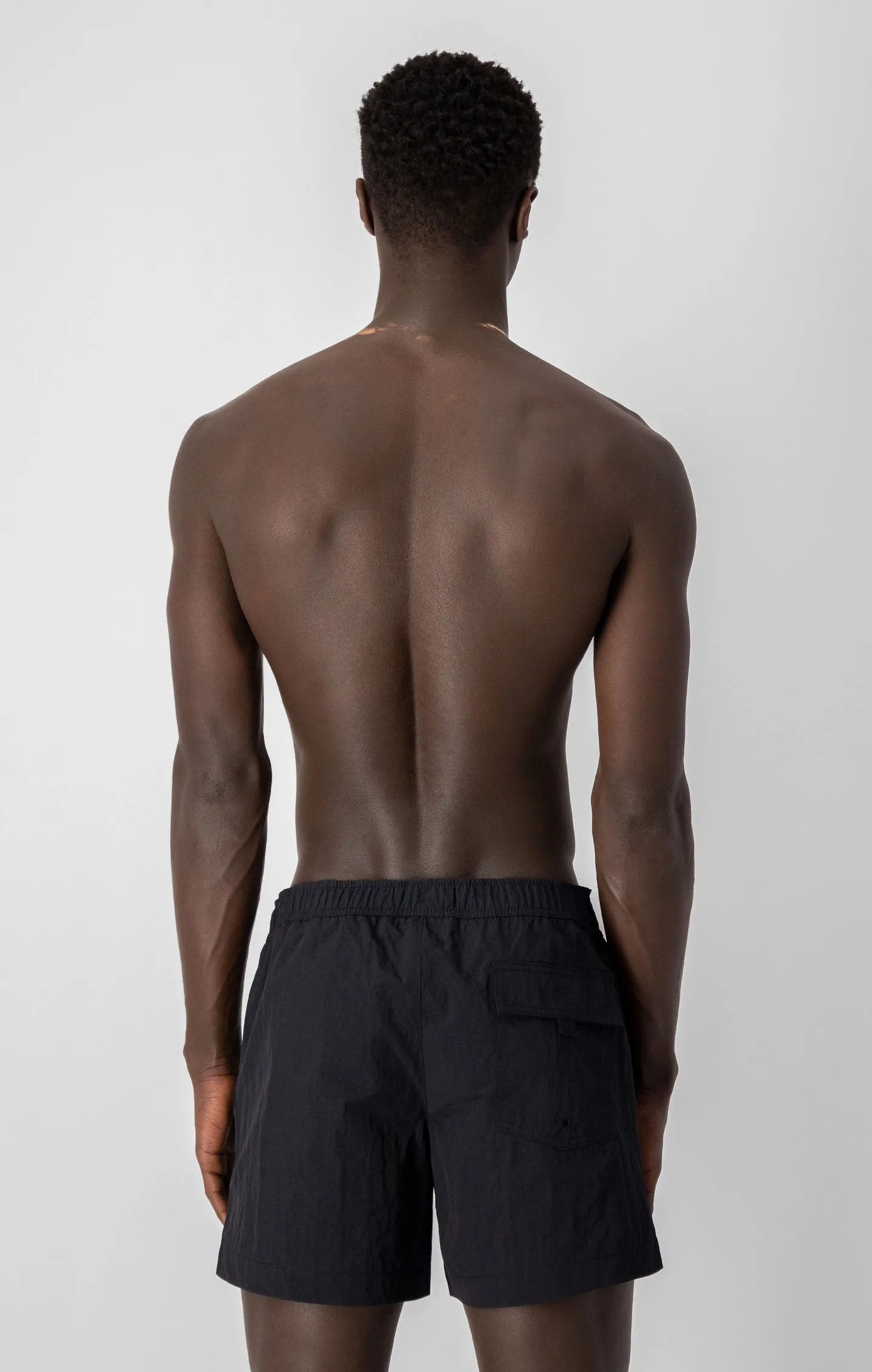 Champion Badeshorts mit Printlogo-Schriftzug in schwarz Champion Badeshorts mit Printlogo-Schriftzug in schwarz