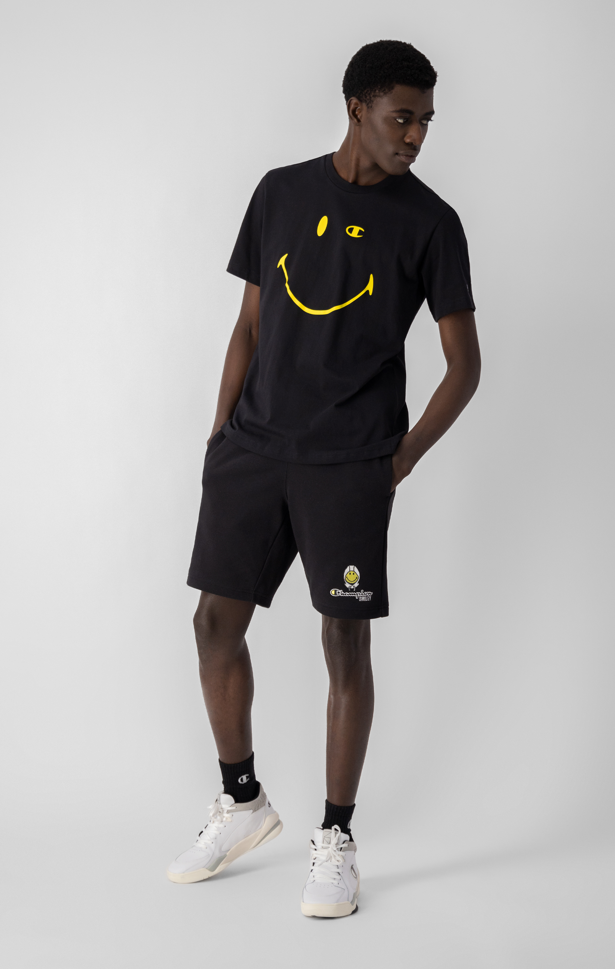 Champion x Smiley Allover T-Shirt in schwarz zum 50 Geburtstag von Smiley 1972-2022 